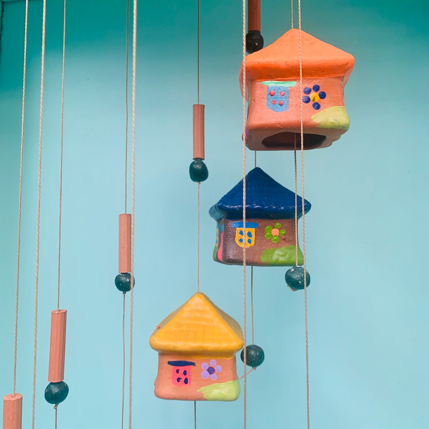 Terracotta  wind chime houses painted